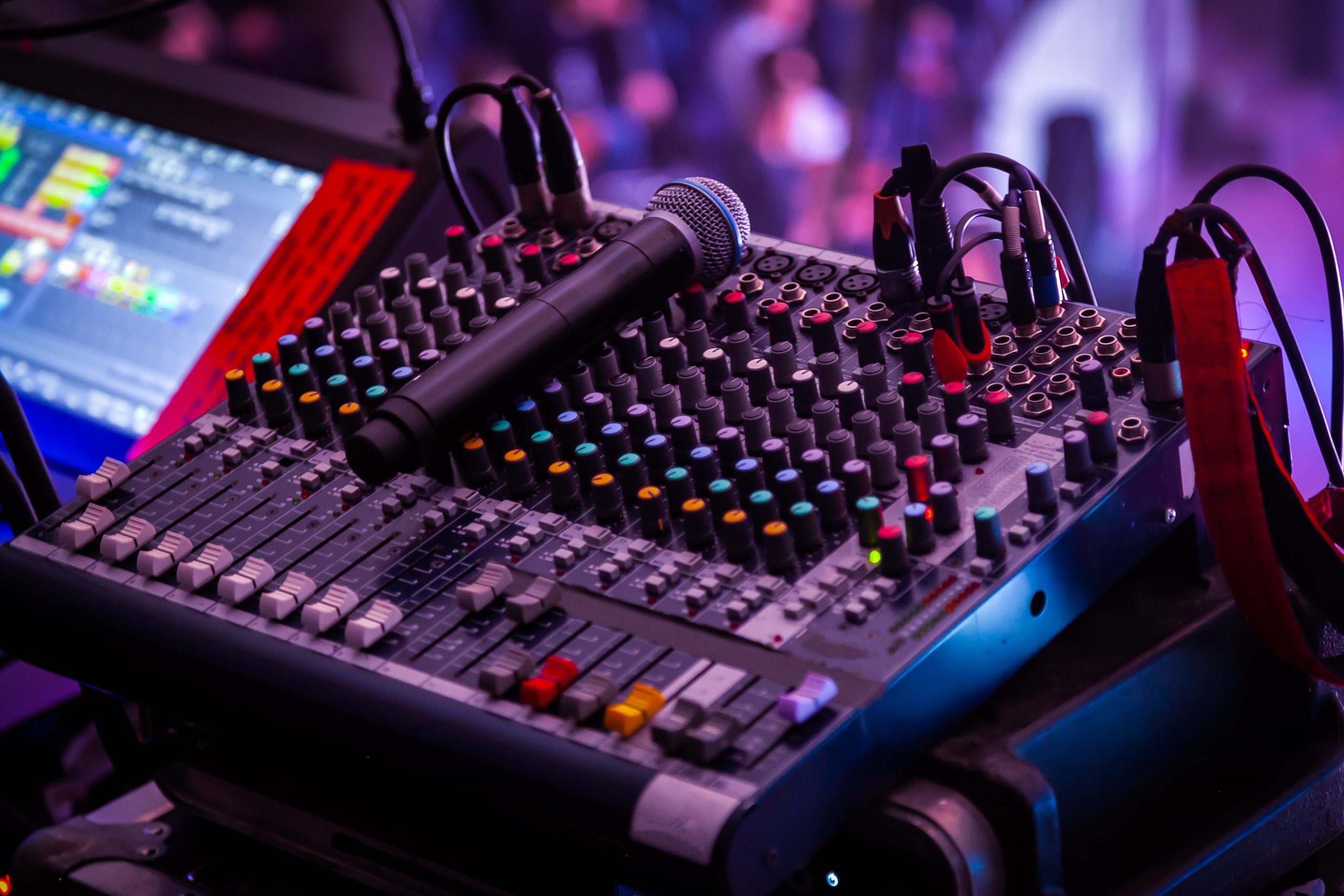 Night club, the concept of nightlife and theatrical life. Professional mixing console at a concert. Remote control for sound engineer. Work place of sound producer at the event